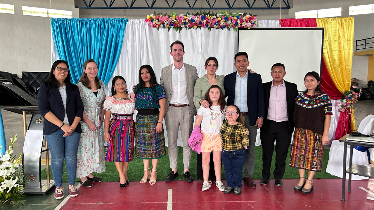 Attendees and speakers pose at the launch event for Balancing Act in Cubulco, B.V., Guatemala.