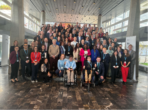 Attendees of the inaugural WHO Disability Health Equity Initiative smile for the camera.
