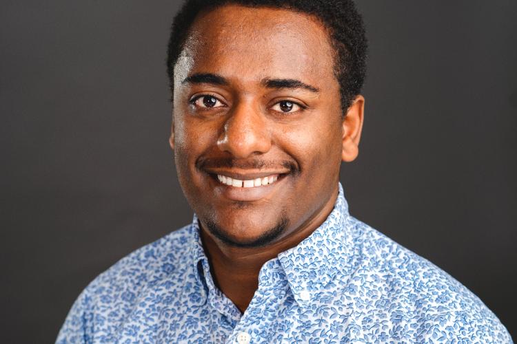 A headshot of Zelalem